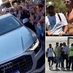 Wow! Amazing: Lionel Messi’s house in Rosario is swamped with hundreds of Argentina fans as his wife Antonella drives him home after two days of celebrating World cup triumph (photos)
