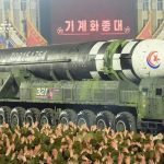 Kim Jong of North Korea shows off largest-ever number of nuclear missiles at night time parade